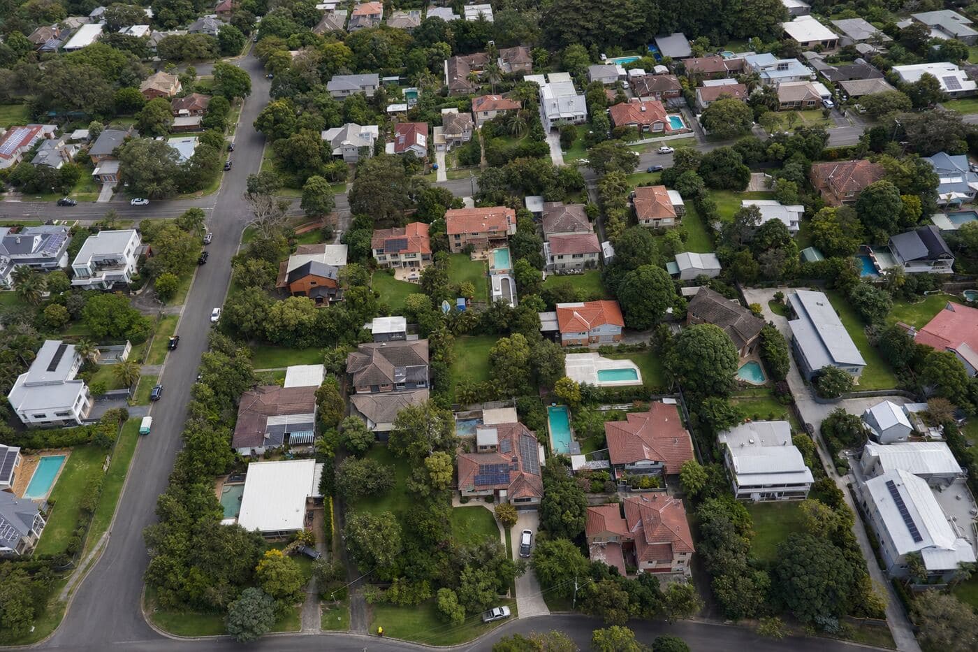 Aerial view of an Australian residential neighbourhood showing lots and rooftops